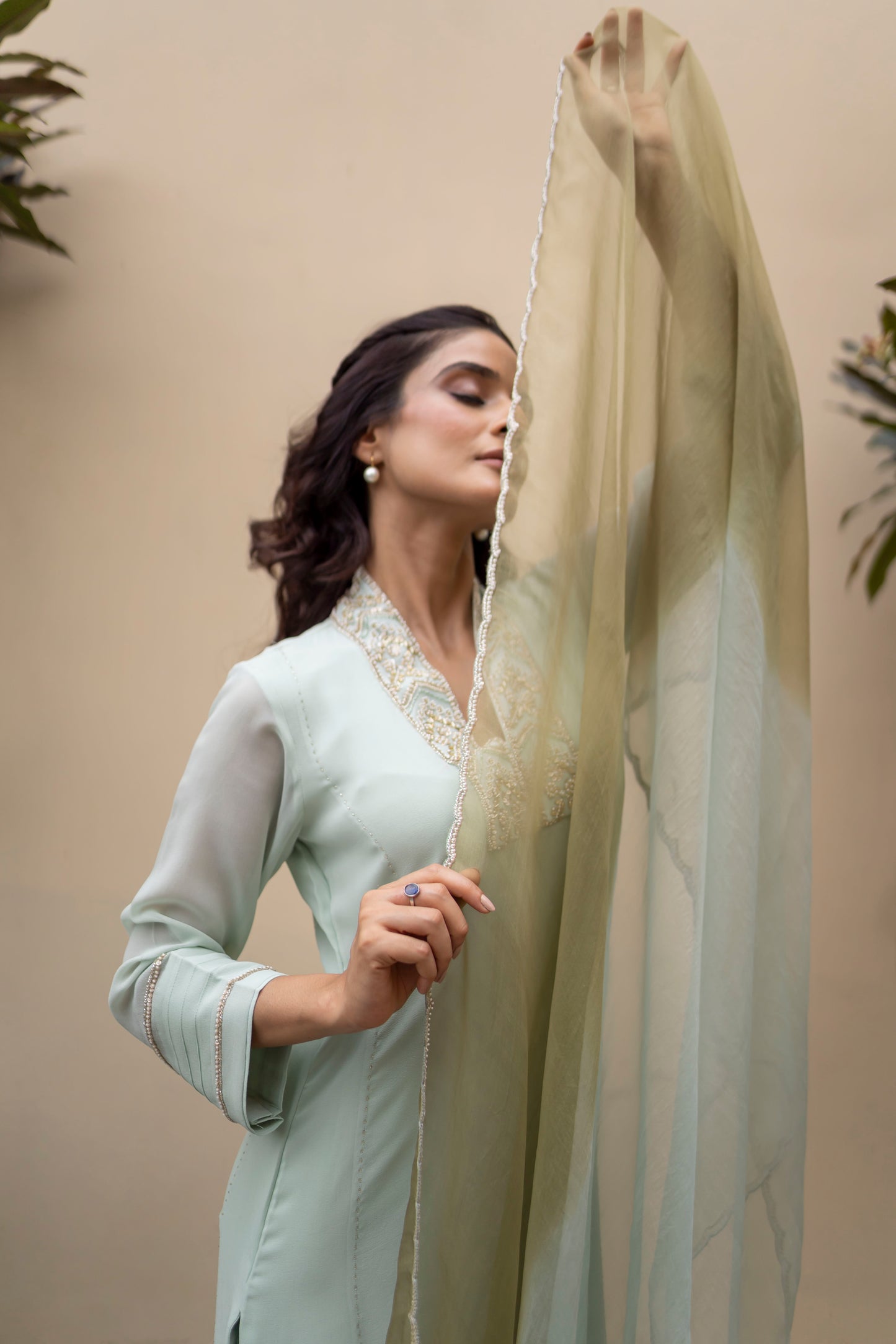 Mint green georgette kali kurta with pants and double shaded organza dupatta.