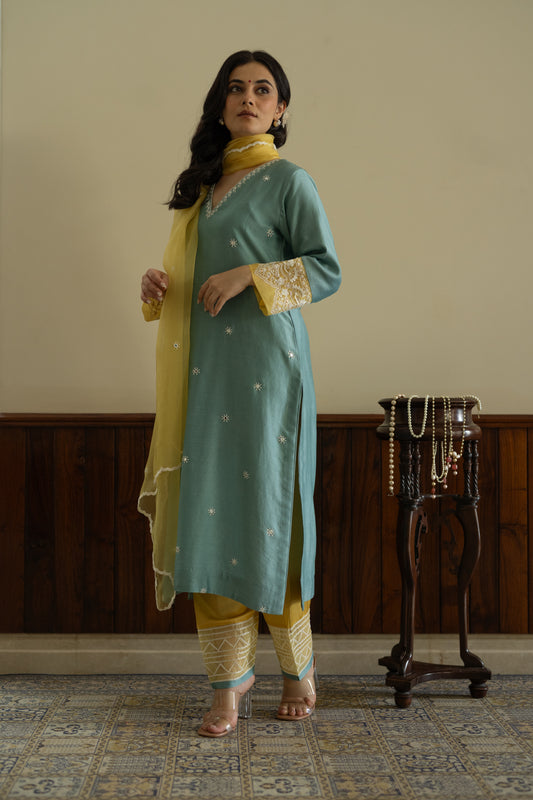 Turquoise kurta with yellow salwar and yellow organza dupatta
