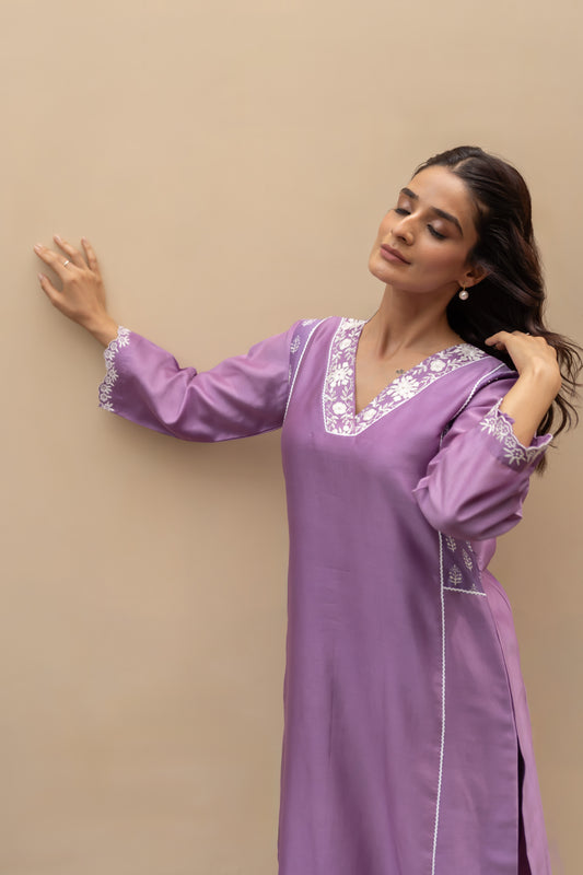 Lilac chanderi kali kurta with pants and organza dupatta.