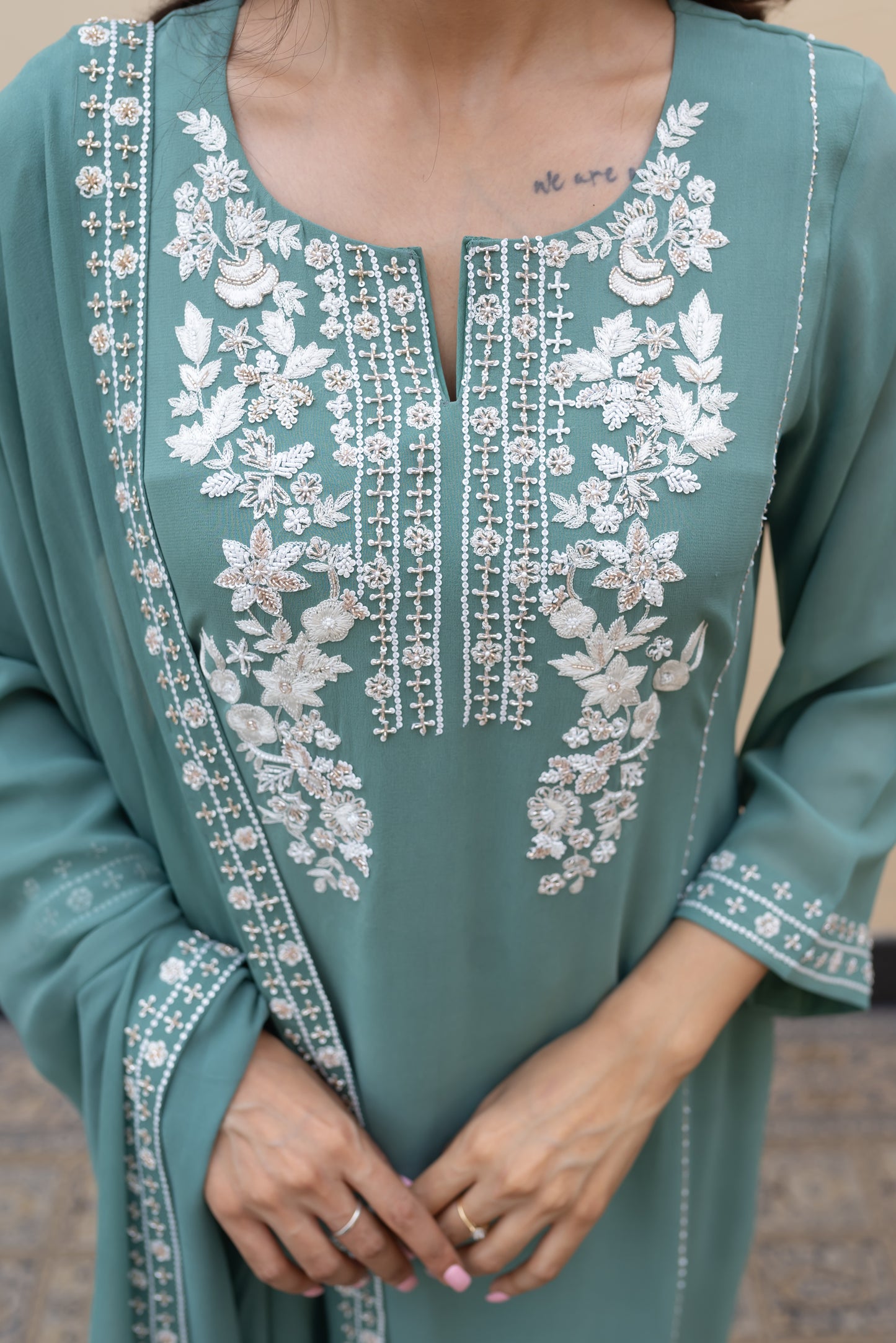Sage green georgette kali kurta with ivory thread