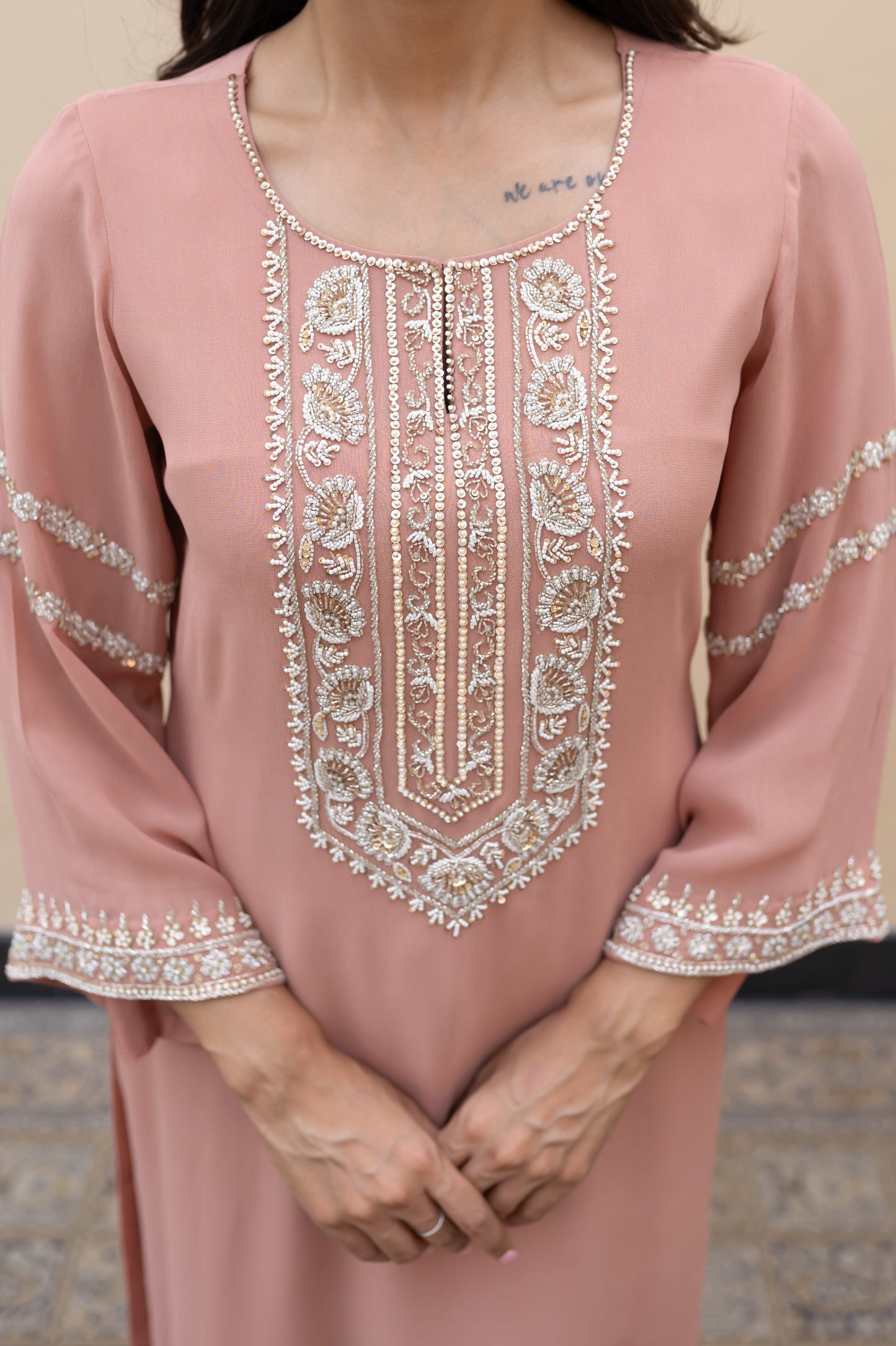 Salmon pink georgette kurta with flared sleeves