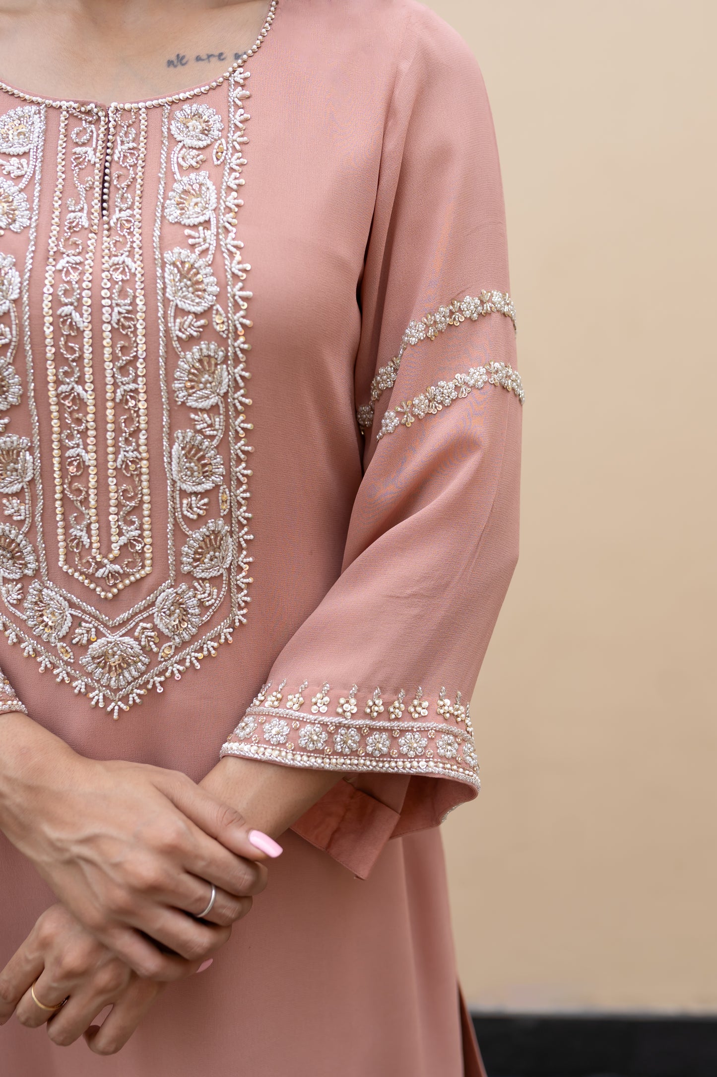 Salmon pink georgette kurta with flared sleeves